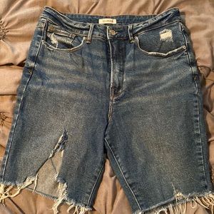 Good American distressed denim shorts